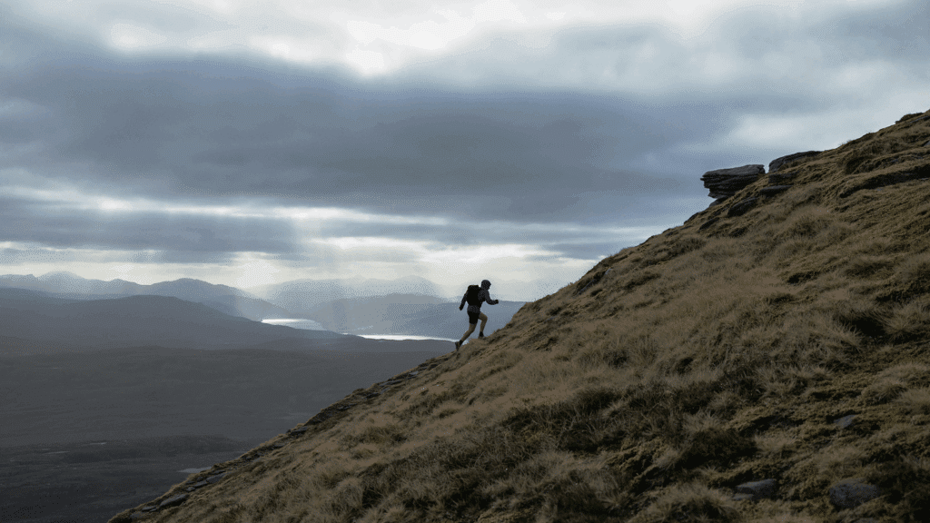 Man running uphill; symbolising the financial strain and uphill challenge of managing ATO tax debt